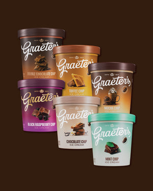 Six pints of Graeter's ice cream arranged in a cluster on a dark brown background. The flavors shown are Double Chocolate Chip, Toffee Chip, Black Raspberry Chip, Chocolate Chip, and Mint Chip.